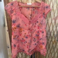 Blouse rose évasée à fleurs