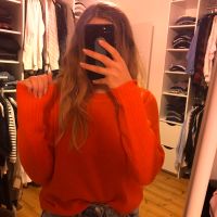 Pull en maille rouge 