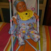 Poussette winnie l'ourson + poupée "hauck"