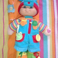 Peluche poupon coloré, multi activités