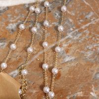 Collier de perles inspirÃ© de la marque Chanel