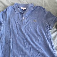 Polo bleu Lacoste 