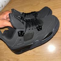 Jordan 4 black cat